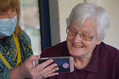 Elderly person on the phone