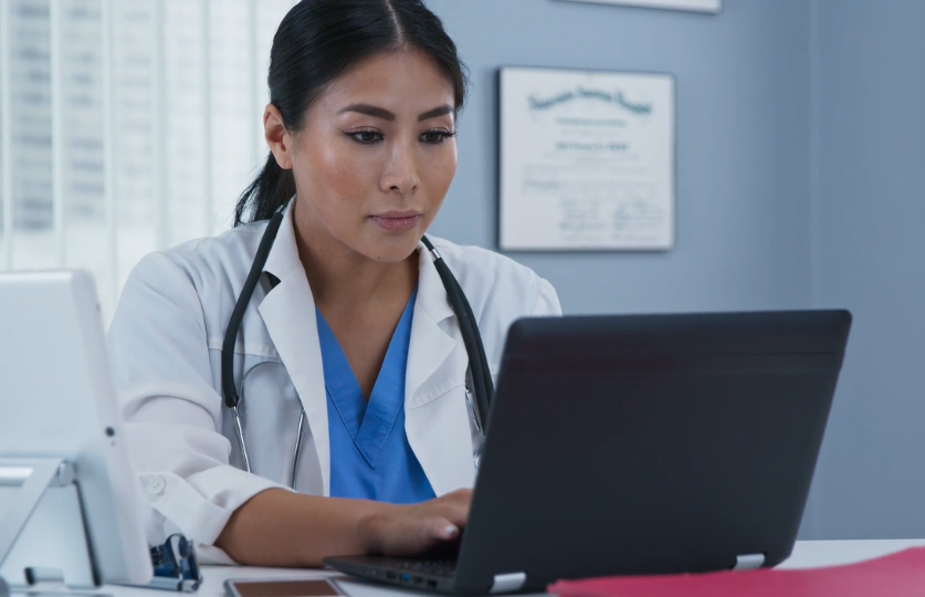 Healthcare professional at desk